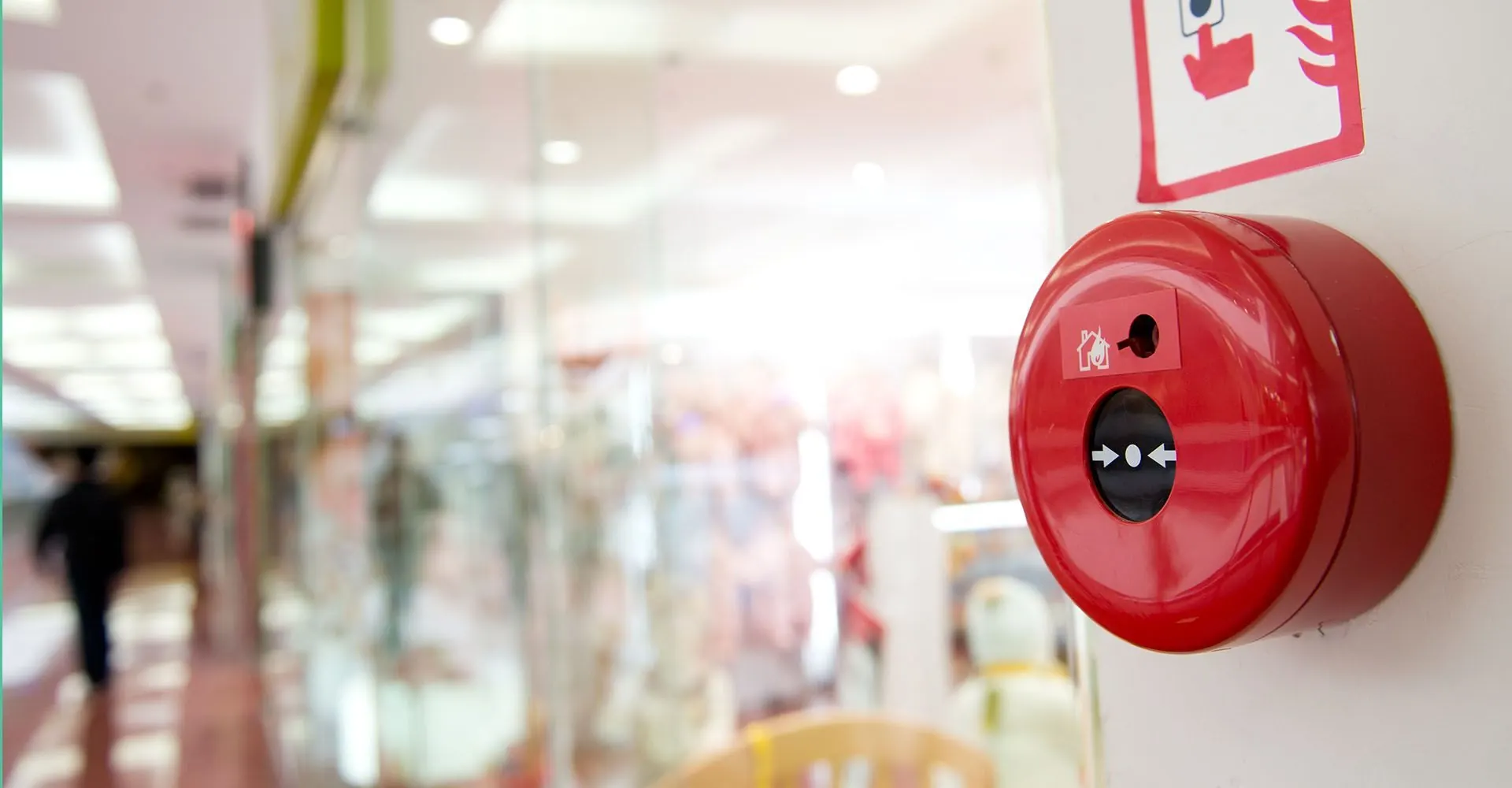 Fire alarm call point on a wall